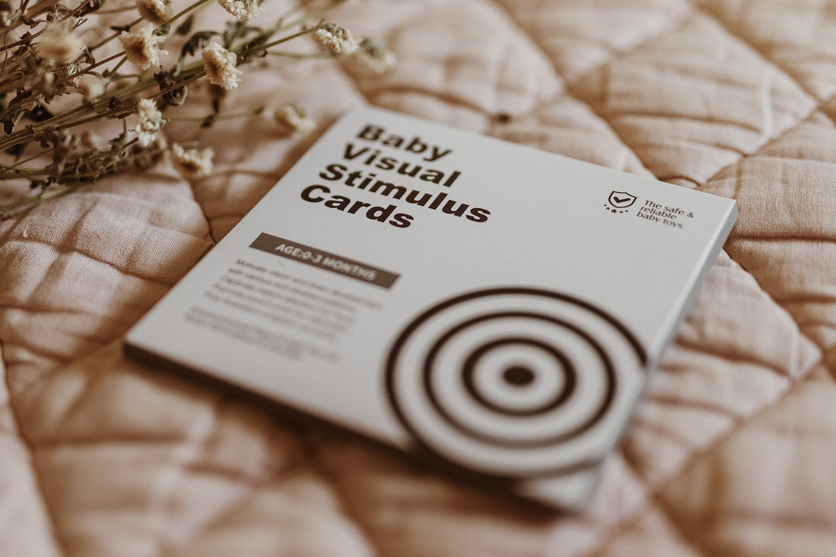 High-contrast black and white visual stimulus cards for 0–3 months, included in the Tiny Firsts Bundle