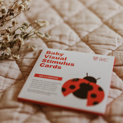 Black, white and red high-contrast visual stimulus cards for 3–6 months, designed for early eye development